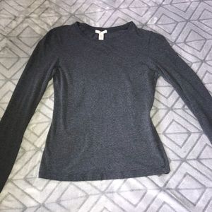 Dark grey long sleeve top.